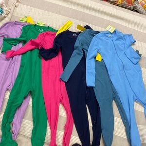 6 Toddlers organic zip pajamas. New wiry tags. Size 3.